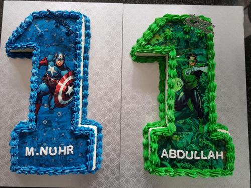 Twins turning 11 Superhero Cakes